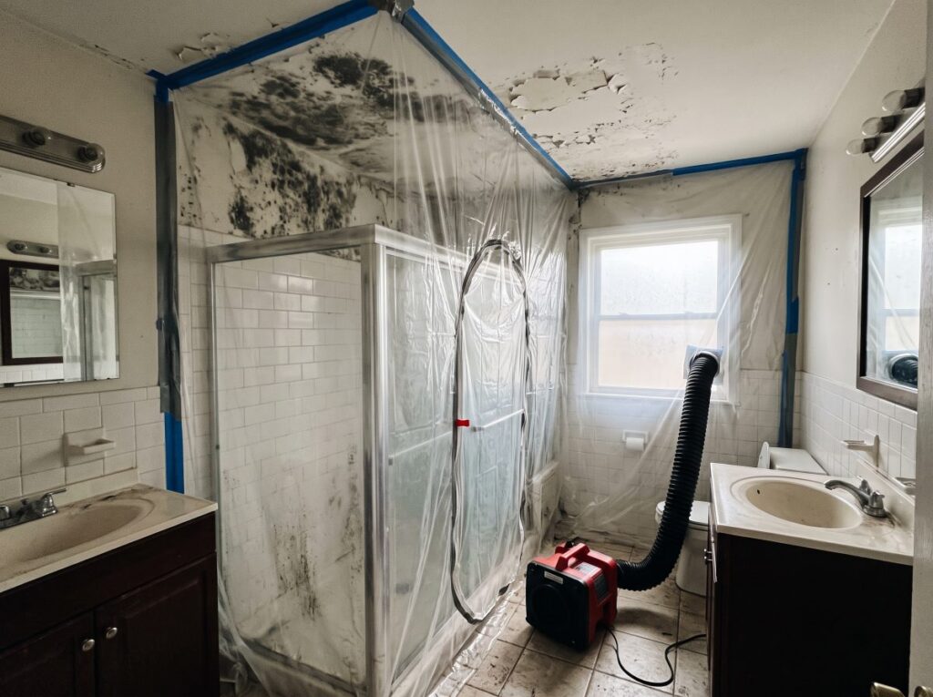 Bathroom mould remediation with plastic containment and negative air machine
